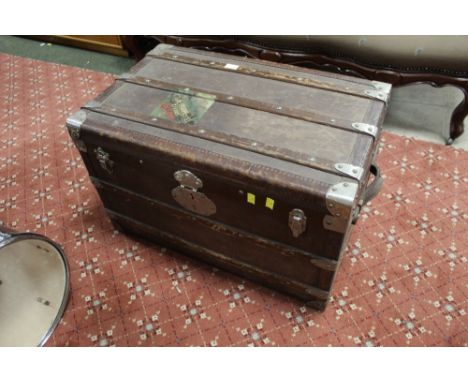 Late 19th/early 20th century metal bound travel trunk with Carlton Hotel label