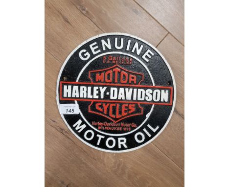 A CAST METAL HARLEY DAVIDSON SIGN