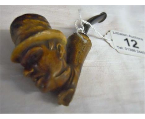 Miniature carved pipe