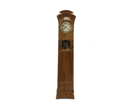 A Camerer Kuss & Co walnut cased longcase clock, with an Arabic silvered dial, inscribed, the movement striking on a gong, wi