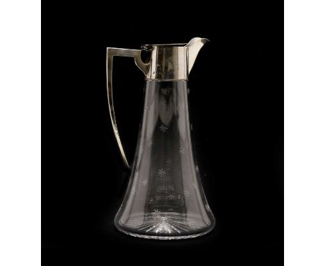 An Edwardian silver mounted and cut glass claret jug, the mounts by William Hutton &amp; Sons Ltd, Birmingham 1904, the body 