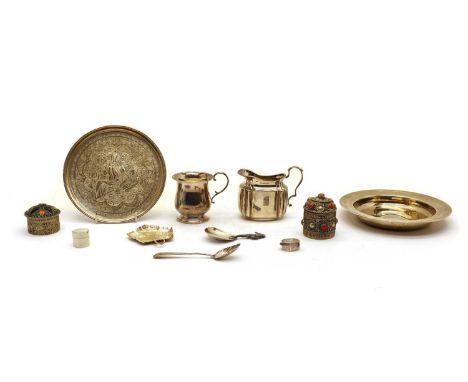A collection of silver items, to include a jug by William Hutton &amp; Sons Ltd, 1899, 7.5cm high, a christening mug, 1925, 7