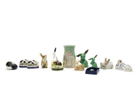 A collection of rabbit related items, to include Royal Crown Derby paperweights, larger missing stopper, a Limoges bonbonnier