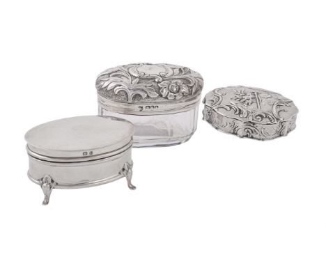 
	
		Three silver or silver mounted boxes, comprising: an Edwardian plain oval small trinket box, by Synyer &amp; Beddoes Bir