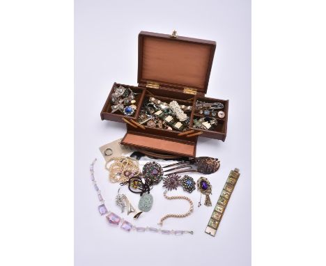 
	
		A collection of costume jewellery, to include a late Victorian micromosaic brooch; an early 20th century white paste and