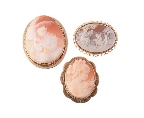 
	
		A 1970s shell cameo brooch, the oval panel carved with Venus playing a harp whilst two cherubs play with a sheep within 