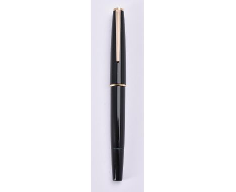 
	
		Montblanc, 320, a black fountain pen, the cap with gilt clip and cap band, the nib stamped 585, piston filling system, i