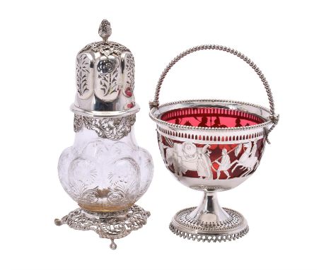 
	
		An Edwardian silver mounted clear glass sugar caster by William Comyns &amp; Sons, London 1901, with a pineapple finial 