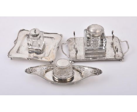 
	
		Three silver mounted ink well, to include: a late Victorian rectangular ink well by Pembrook &amp; Dickins, Birmingham 1