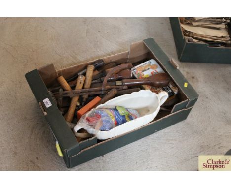 A box of various hand tools and chisels 