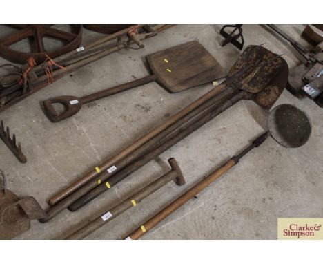 Three long handled garden tools 