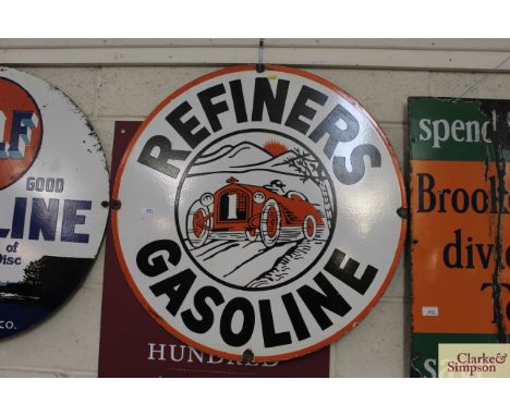 A circular enamel advertising sign for "Refiners Gasoline" approx. 30" dia.