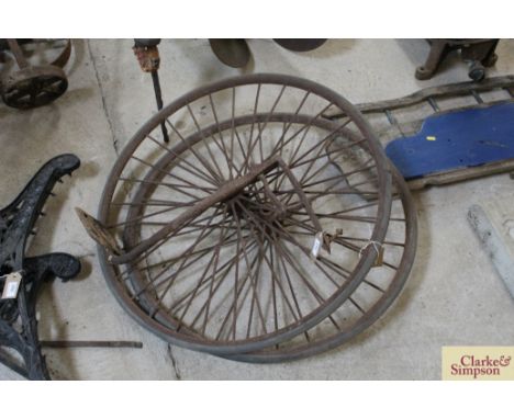 A pair of vintage iron spoked wheels with rubber tyres and a vintage iron cart step (approx.31")