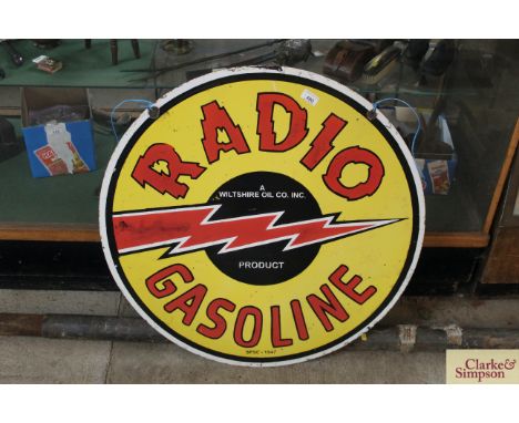 A circular enamel double sided advertising sign for Radio Gasoline, approx. 30" dia.