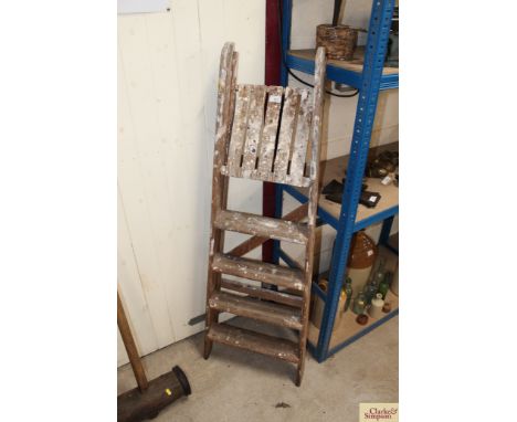 A small wooden step ladder