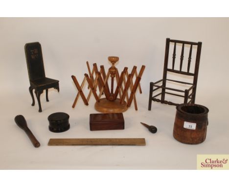 Various 19th Century miscellaneous treen items to include a wool winder, an engine turned lidded ebony snuff box, boxwood rul