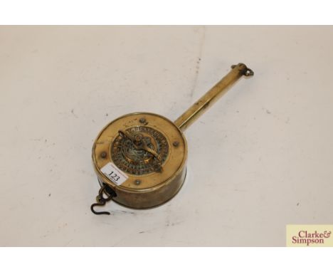 A rare early 19th Century brass clockwork rotating bottle jack by T R Restell's