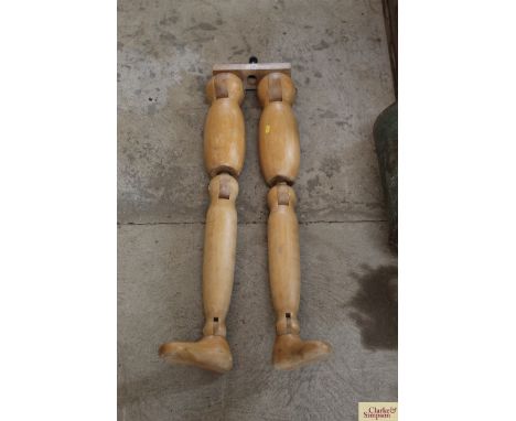 A pair of vintage wooden joint mannequin legs 