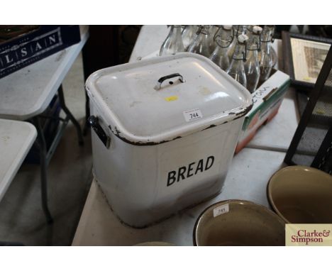 A vintage enamel bread bin
