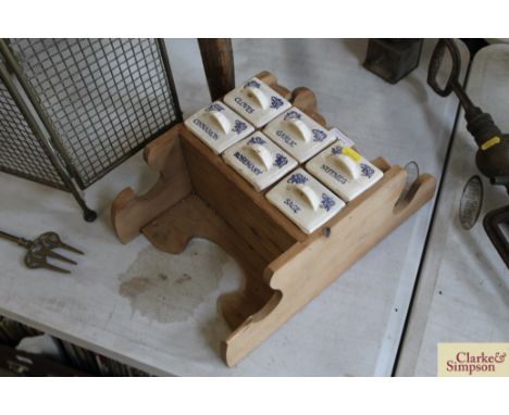 A pine and china hanging spice/herb rack