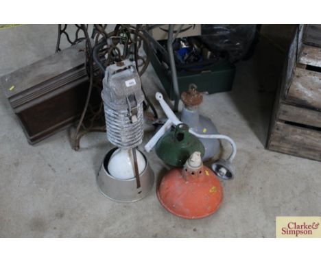 Three vintage enamel light shades and a large lamp