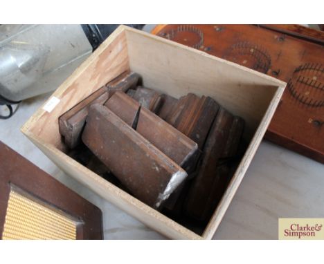 A box of vintage moulding planes 