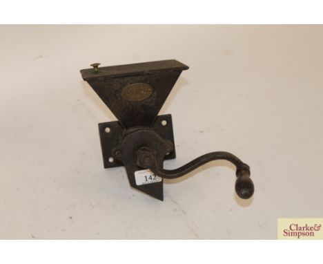 A Kenrick No.3 wall mounting coffee grinder
