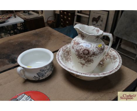 A Victorian passion flower pattern toilet jug and basin and a blue and white floral pattern Shelly chamber pot