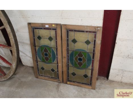A pair of leaded light window panels 