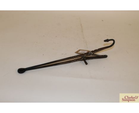 A pair of vintage steel down hearth pipe tongs