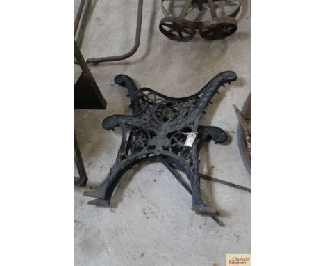A pair of ornate bench ends 