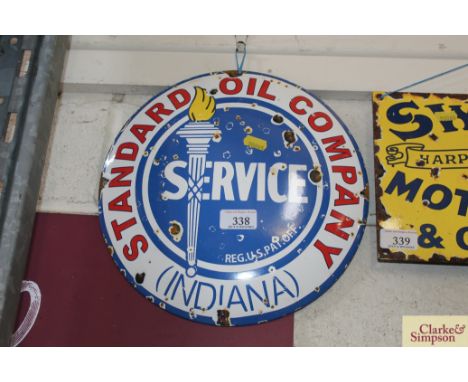 A Standard Oil Co. (Indiana) circular enamel sign, approx. 12" dia.