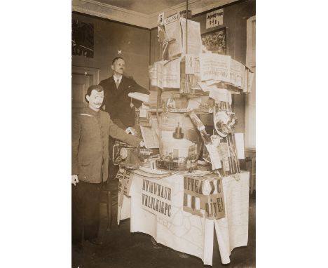 Dada Berlin -- Photographer unknown. Johannes Baader next to his object "The Great Plasto-Dio-Dada-Drama: Germany's Greatness