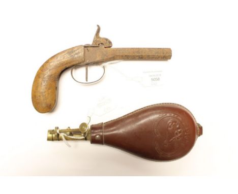 A small percussion cap pistol with 75mm long octagonal barrel with 10mm bore. Rusted overall. Wooden grips. Marked "X 8" to r