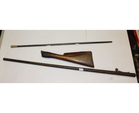 A Percussion cap Poachers Shotgun. 28 inch barrel marked "Day's Patent I R" .Approx 20mm bore. Folding trigger. Screw on wood