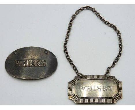 A Sampson Mordan & Co. silver whisky label lacking chain twinned with a 1960 Francis Howard Ltd. silver label with chain, 23.