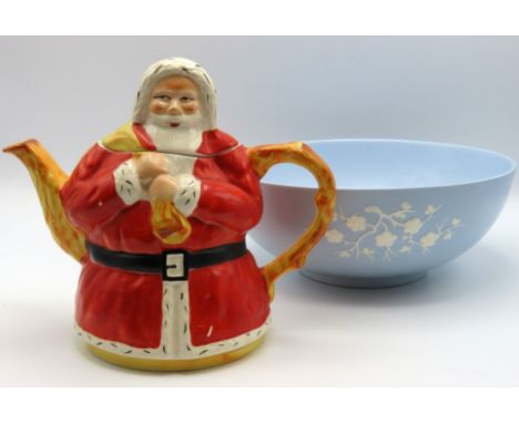 A late 1930's 'Lucky Santa Claus' teapot 185mm tall, twinned with a Copeland Spode bowl with relief decor