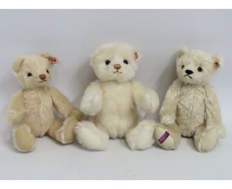 Three Steiff teddy bears including one with 'Liberty' label to foot, largest 290mm