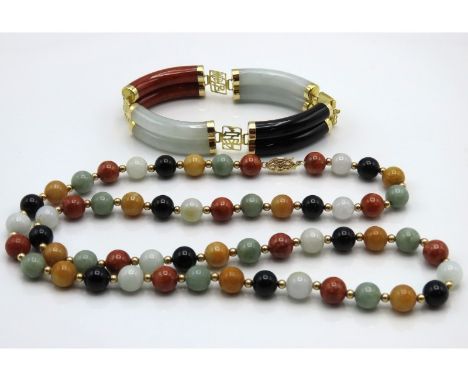 A 14ct gold mounted Burmese jade necklace & bracelet set, lengths 585mm necklace & 193mm bracelet 