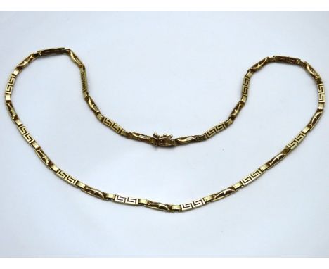 A 14ct gold 440mm long chain decorated with dolphins, 10.4g
