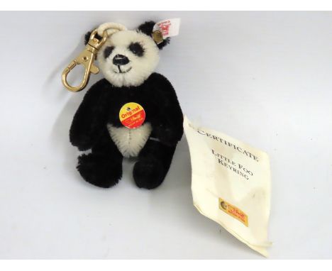 A Steiff panda keyring with labels, 150mm inclusive 