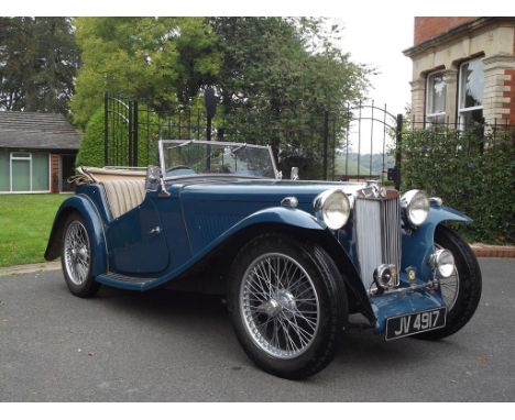 A 1936 MG TA, registration number JV 4917, chassis number TA 0291, engine number MPJM 39011, Teal blue. MG TA was the first o