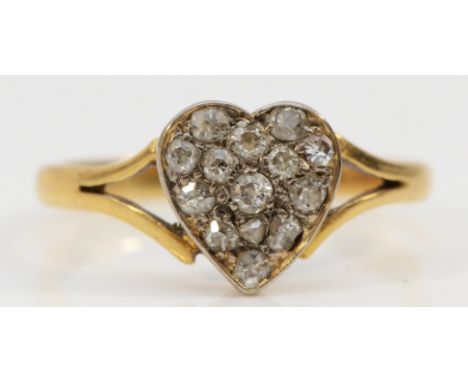 An 18ct gold and old cut brilliant diamond set heart shape cluster ring, 10 x 9mm, Q, 2.9gm