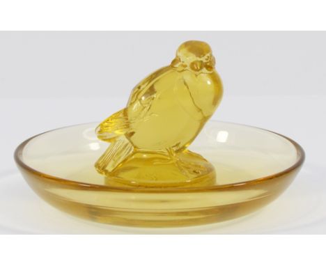 René Lalique (French, 1860-1945): A citrine yellow glass cendrier or trinket dish, 9cm diameter, engraved R Lalique France in