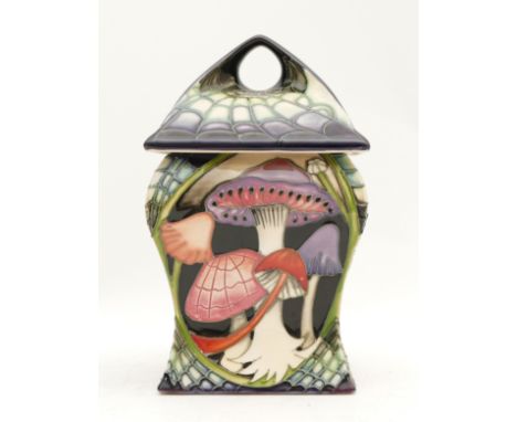 A Moorcroft lidded jar, in the pattern, 'Twilight Bonnets', limited edition, 45/100, designed by Vicky Lovatt, dated 2010, H-