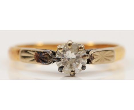 An 18ct gold vintage brilliant cut diamond solitaire ring, London 1968, engraving to the shoulders, L 1/2, 2.2gestimate 5mm d