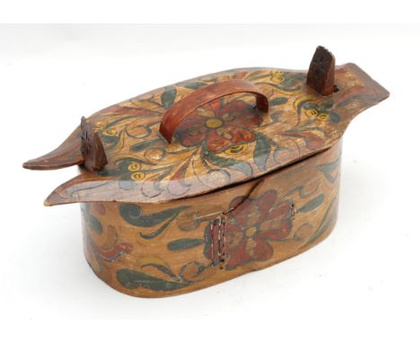 A Scandinavian Folk Art bentwood oval box, handpainted and carved with floral details and a small wooden handle to the top, 1