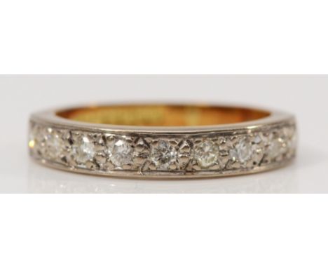 An 18ct gold brilliant cut diamond half eternity ring, J 1/2, 3.3g