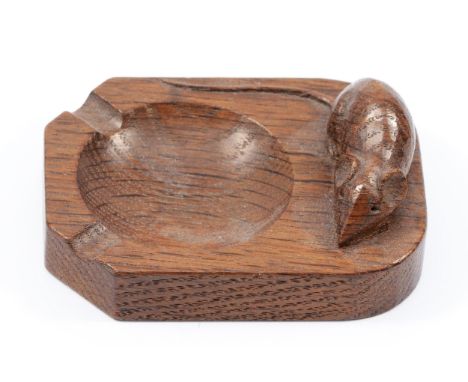 Robert Mouseman Thompson (Kilburn) an English Oak ashtray, of standard rectangular form, with carved mouse trademark, 10cm