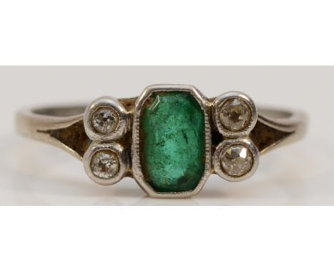 An Art Deco, believed platinum, emerald and old cut diamond ring, stone 7 x 4mm, O, 3gm